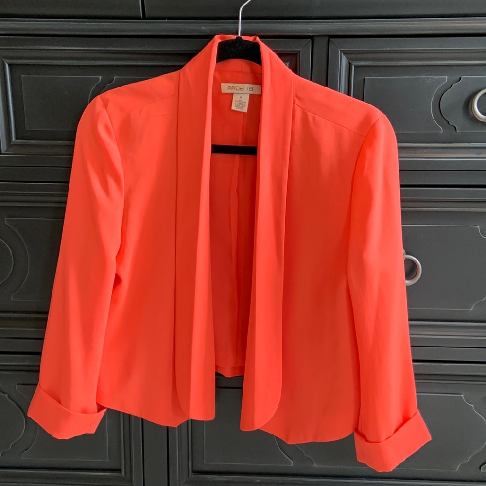 Short blazer. Bright salmon color.